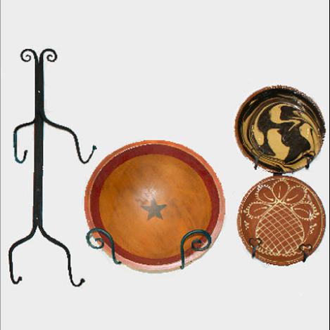 An assortment of plate and bowl holders.