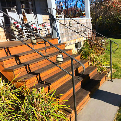 Double railings on 8 steps to porch.