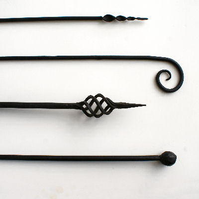 Rod ends spiral, scroll, basket and knob.